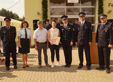 Torsten Ruhl (OWF Preilack), Elvira Hölzner (Amtsdirektorin des Amtes Peitz), Jürgen Wulff (Seniorchef), Silvia Wulff-Branaschk (Geschäftsführerin), Robert Buder (Vorsitzender KFV), Mirko Schneider (stellv. Amtswehrführer der FF Peitz), René Sonke (ehrenamtlicher Bürgermeister der Gemeinde Turnow-Preilack)